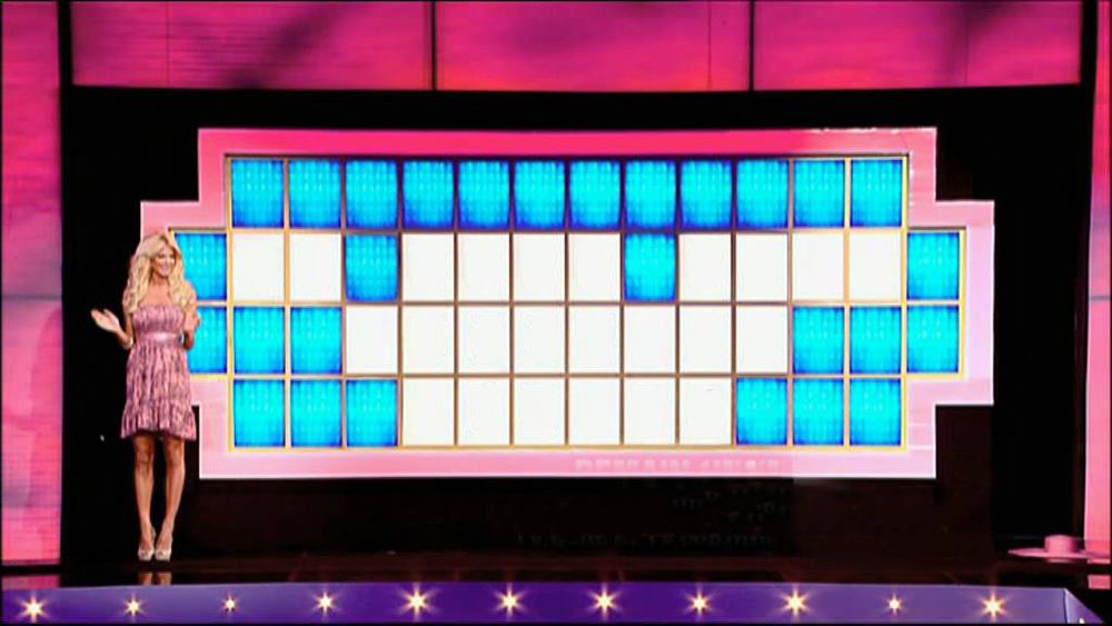 Image du tableau de l'émission La Roue de la fortune sur lequel il faut deviner une phrase ou une expression. Le pattern est de 2 puis 4 puis 4 puis 8 puis 6 lettres, on peut par exemple écrire "Je suis très contente, madame"