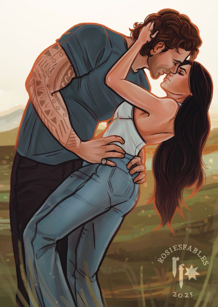 A digital illustration of a romantic couple embracing in a sunlit field. The man, with wavy brown hair, a strong jawline, and a tattooed arm, wears a fitted dark green/teal T-shirt and black jeans. He leans in with an affectionate gaze as he holds the woman's waist. The woman, with long, flowing dark hair, wears a white tank top and light blue flare jeans. She tilts her head back, her fingers tangled in his hair, as they share an intimate moment. The background features soft, blurred earthy tones, suggesting an outdoor setting. The signature 'Rosiesfables 2025' is visible in the bottom right corner.