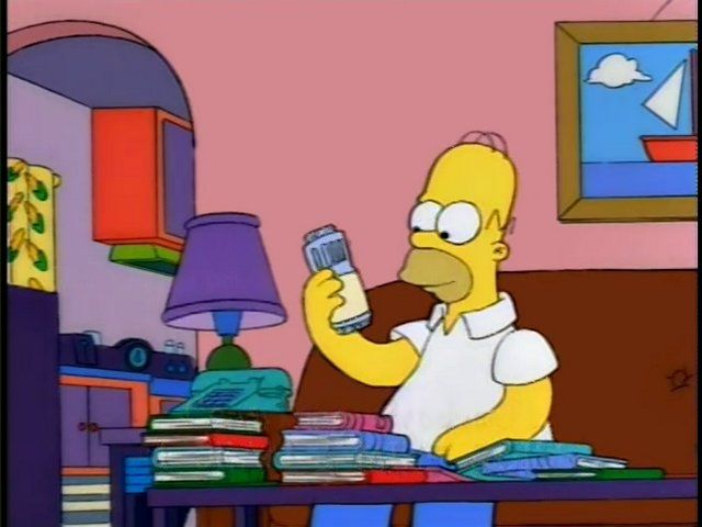 Homer Simpson holding a jar of honey-roasted peanuts in the classic honey-roasted peanuts scene from the Simpsons