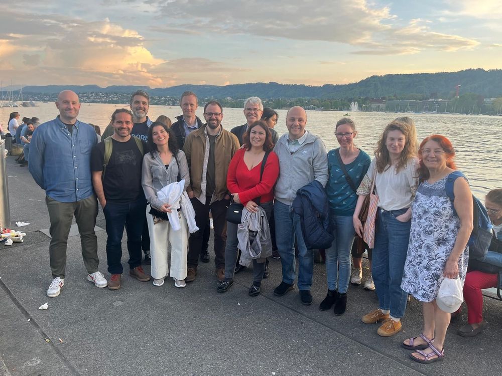 Photo of 12 soundscape researchers in front of Lake Zurich.