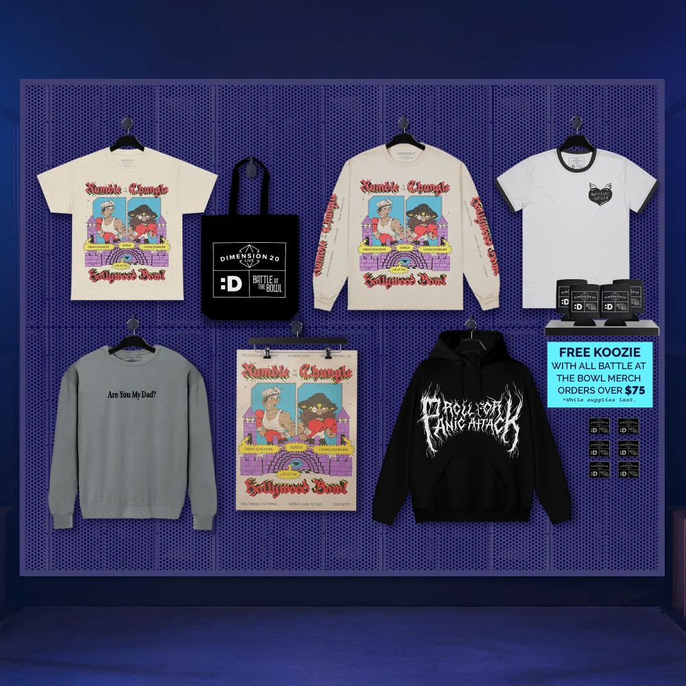 Display of Dimension 20 merch on a purple pegboard: graphic tees, long-sleeve, hoodie, gray sweatshirt, tote bag, poster and a free koozie promo sign.

Also note: a free koozie with all merch orders over $75!