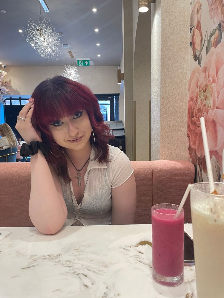 Beautiful girl with dark red hair 