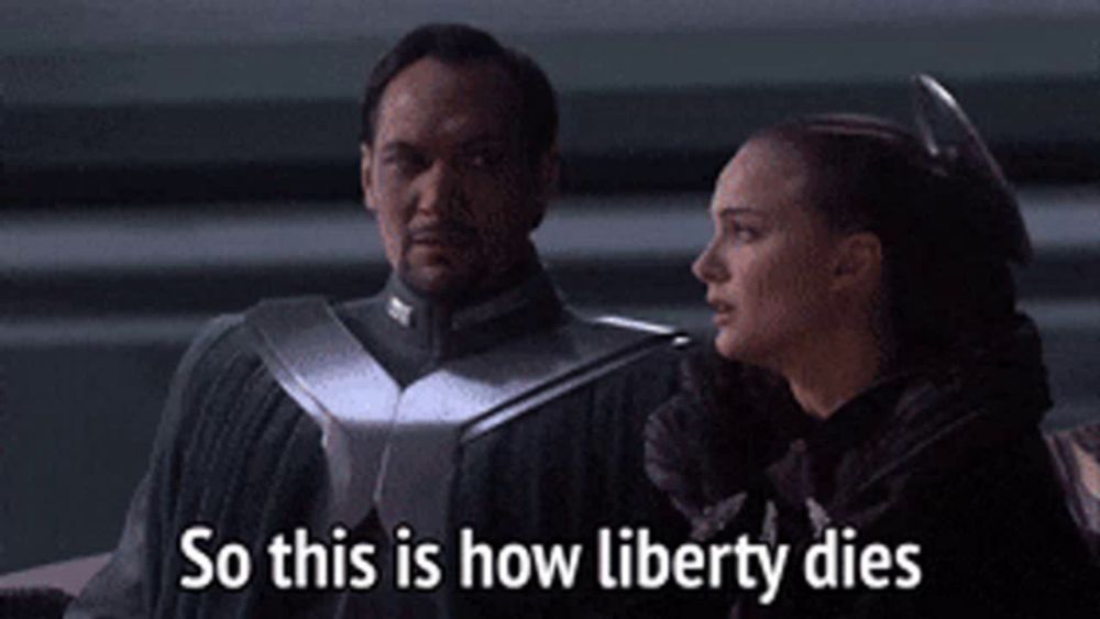 a man and a woman are standing next to each other with the words so this is how liberty dies