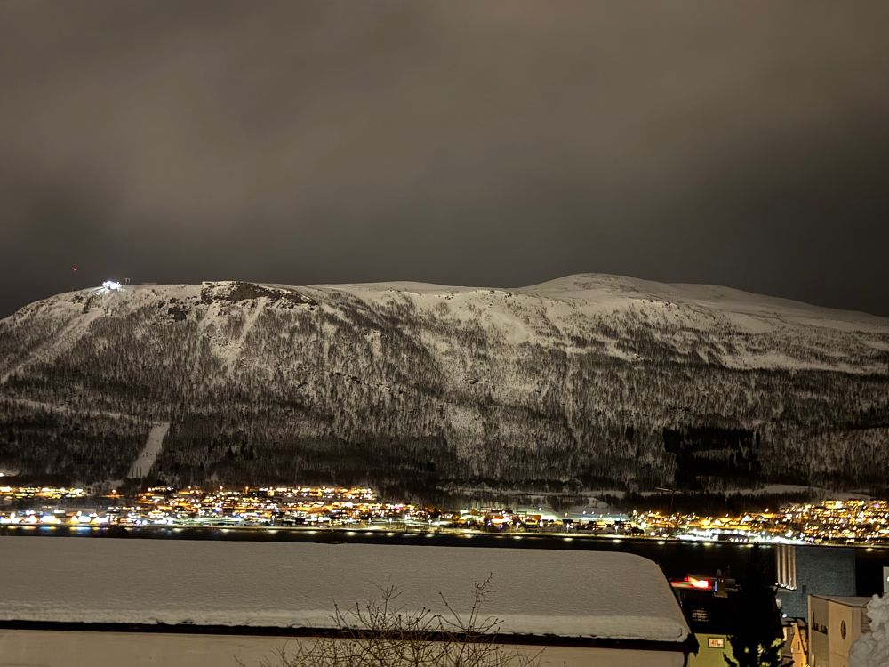 Photo of snow covered mountain in Tromsø, Norway. 
