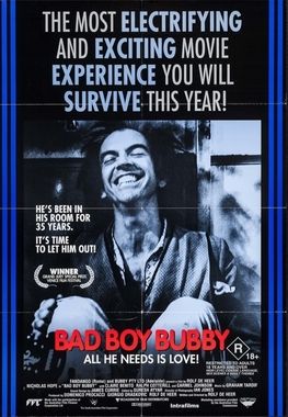 Movie poster for Bad Boy Bubby: "the most electrifying and exciting movie experience you will survive this year!". An image of the titular character, a man sitting on the floor grinning. He's been in his room for 35 years--it's time to let him out! Rated R. 