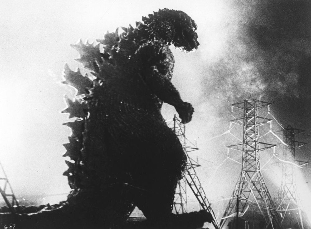 A B&W screenshot from the 1954 "Godzilla", depicting the titular monster