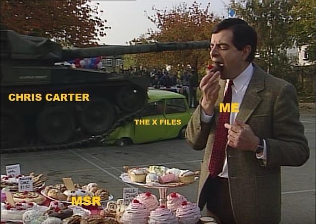 Mr. Bean („me“) is eating all the cake („msr“), while a tank („CC“) runs over a car („txf“).