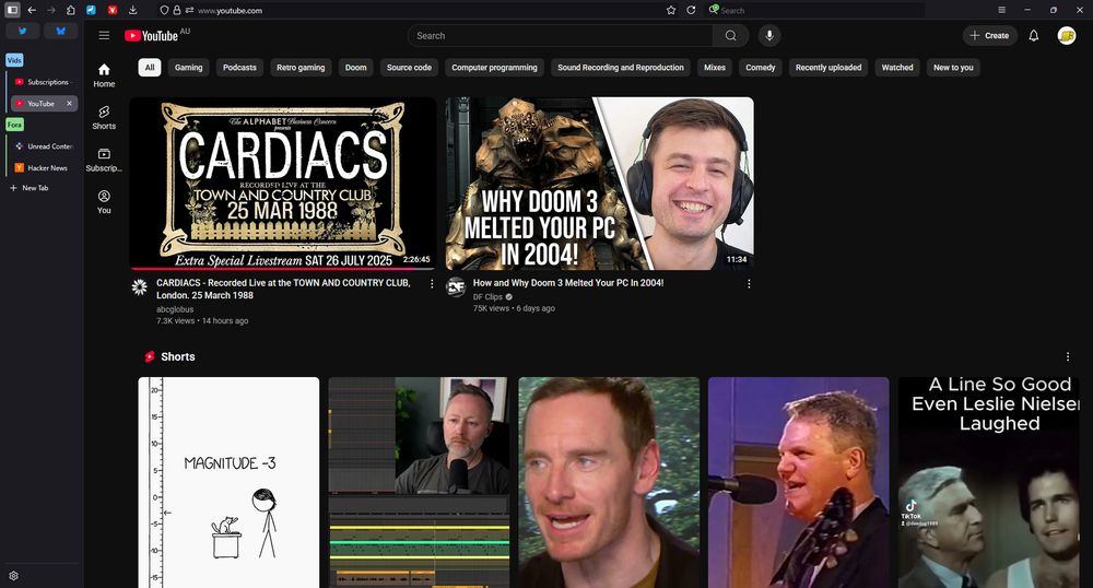 The exact same YouTube Home screen, but with the Control Panel for YouTube extension turned off - it contains 2 giant video thumbnails (one of which has already been watched), and fails to contain the 5 massive Shorts thumbnails which appear below them