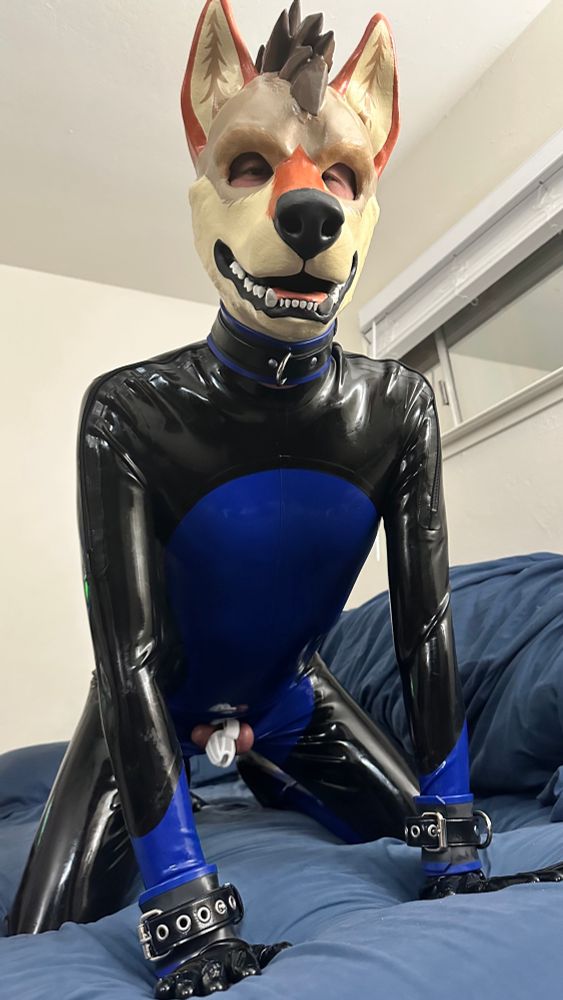 man in rubber kink gear