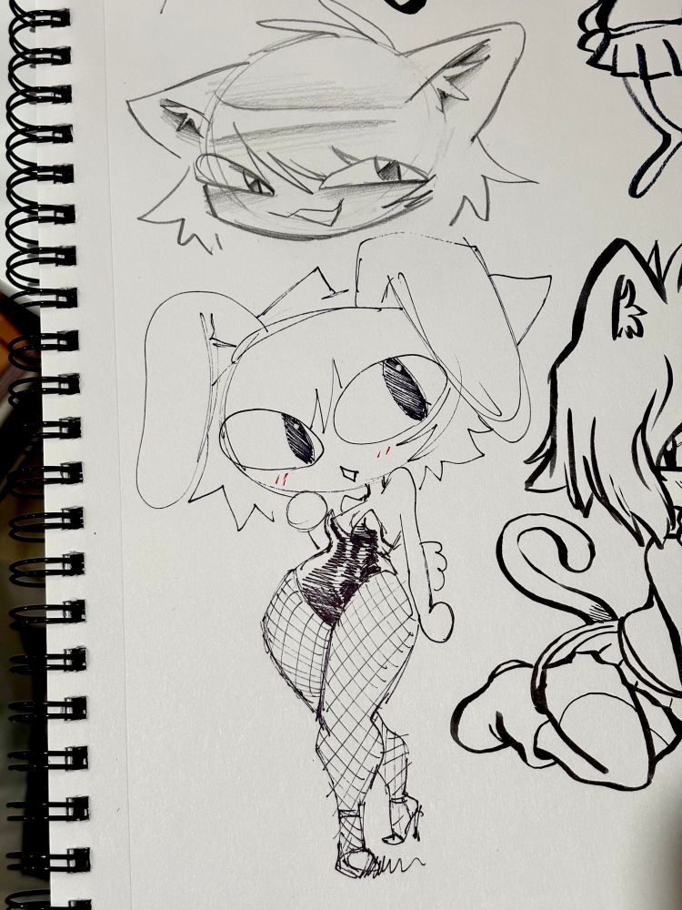 Neco-arc in a bunny suit (she’s tucking her real tail)