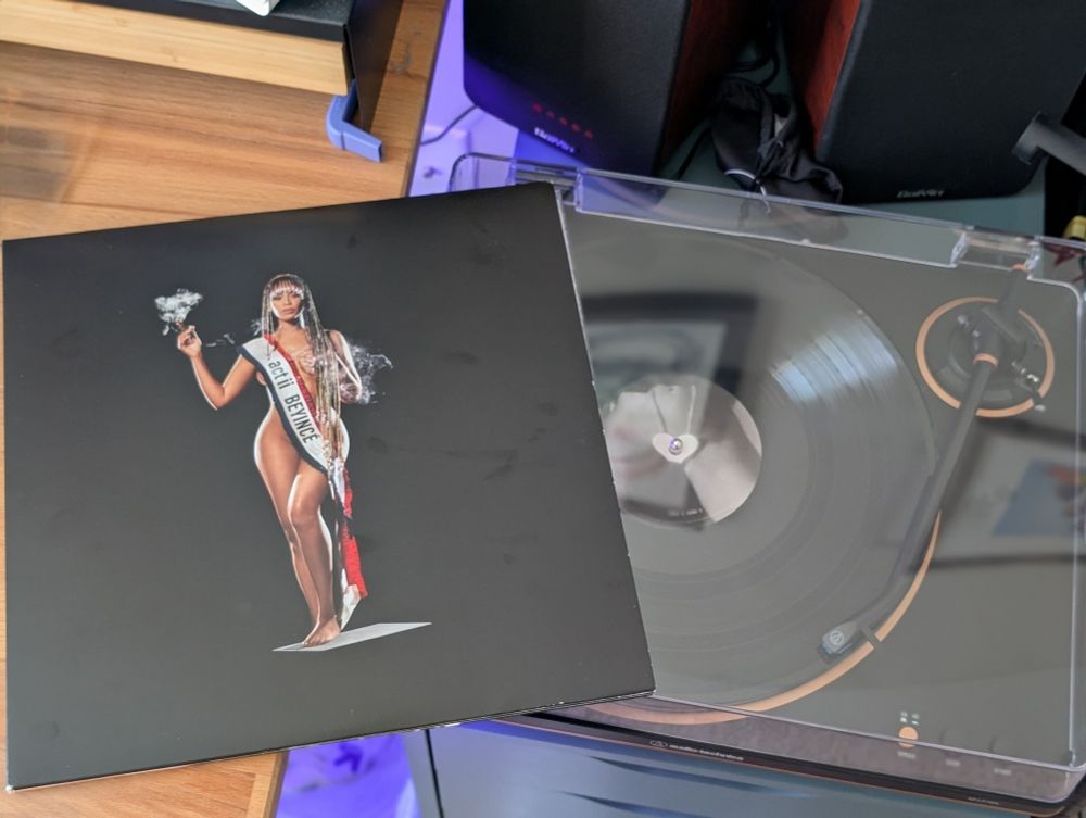 Record player with vinyl of Beyonce act 2 vinyl