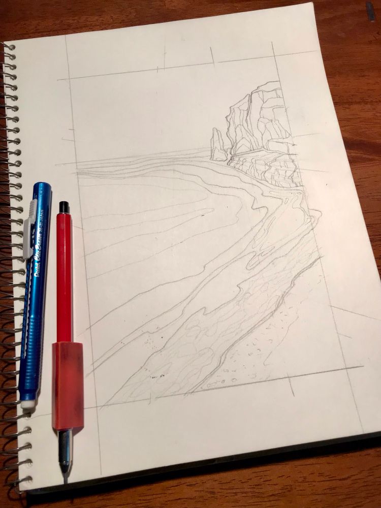 a graphite sketch of a rocky coastline in a spiral bound sketchbook with blue eraser pen and red mechanical pencil.  