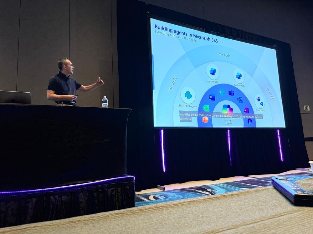Paolo on stage explaining the extensibility model of Microsoft 365 Copilot