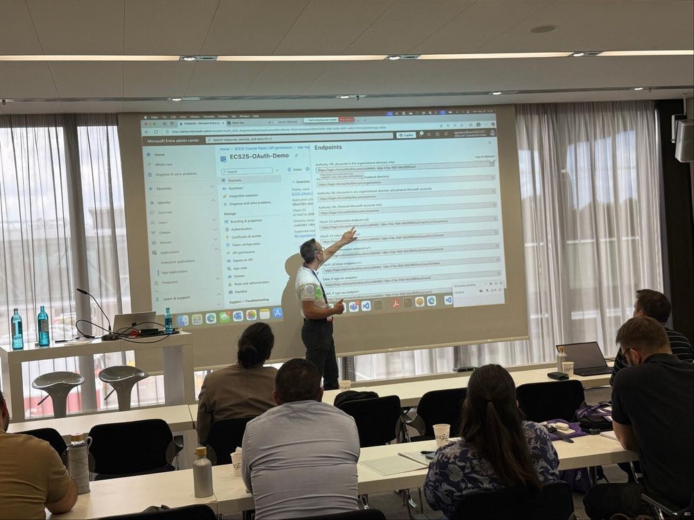 Paolo explaining app registration and OAuth during the Microsoft 365 Extensibility workshop at ECS2025