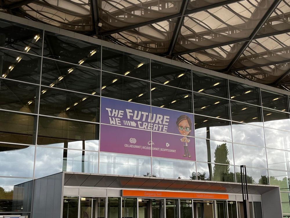 The ECS2025 main entrance with Lucy welcoming attendees