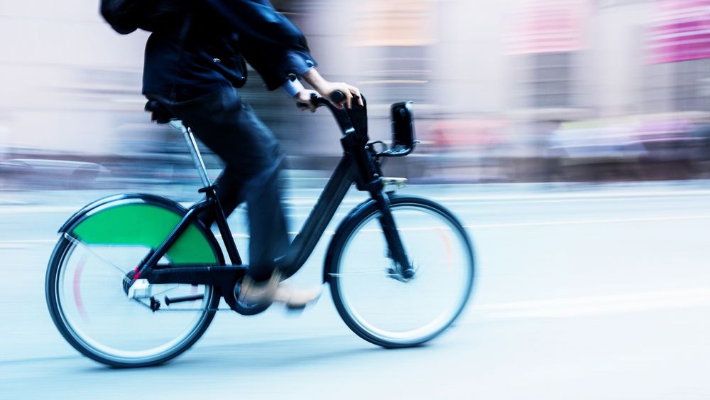 A person riding a bicycle.
