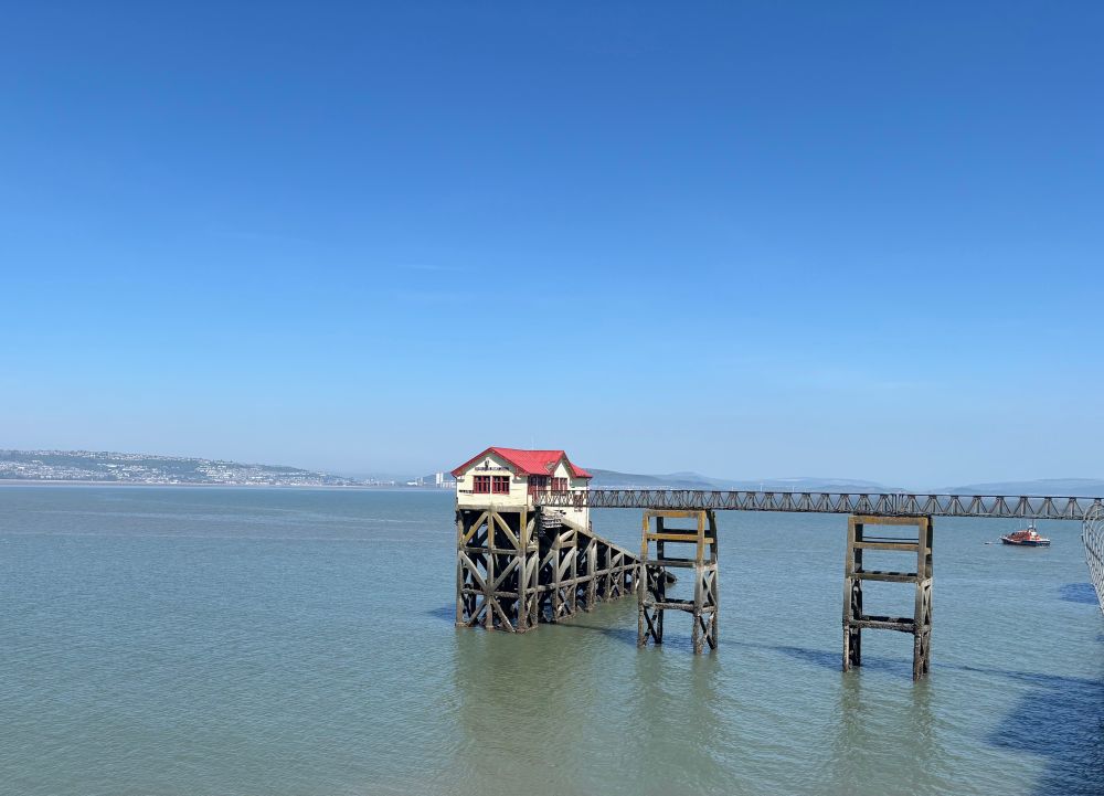 Disused lifeboat station at the end of Mumbles pier on a fine sunny day. 