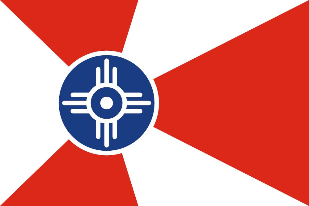 The flag of Wichita, Kansas, with some interesting off-kilter triangular stripes going on.