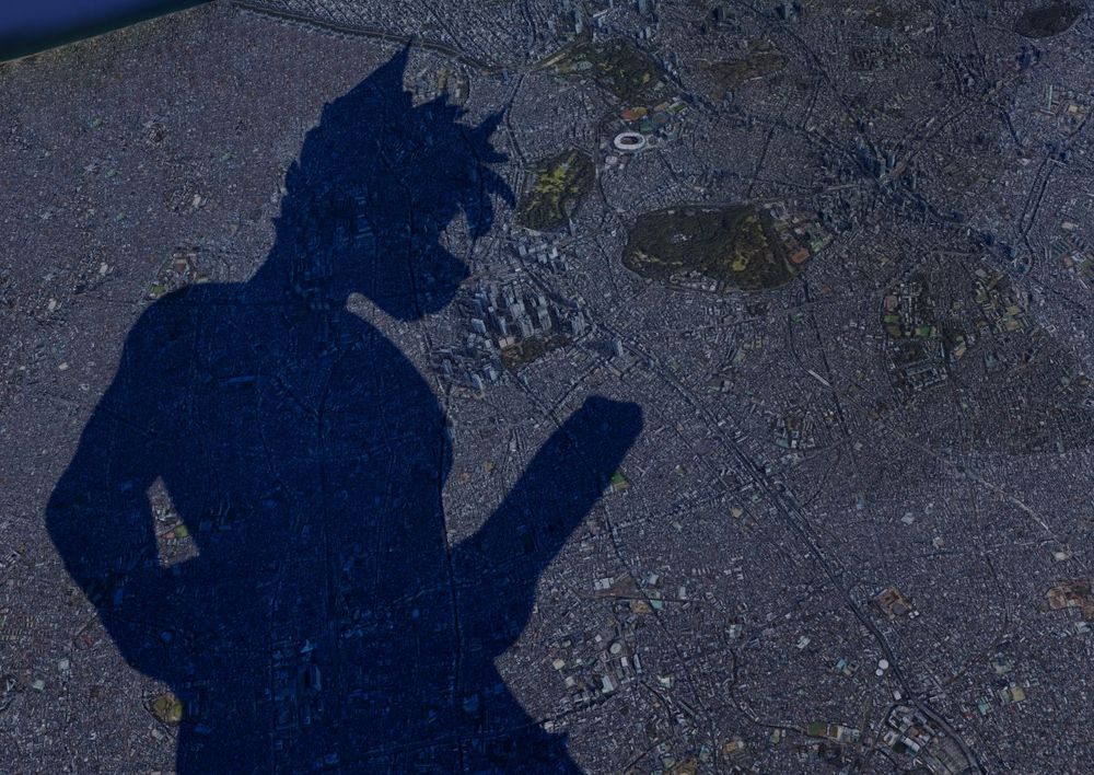 The silhouette from a mega macro anthro fox towers far above Shinjuku, his erection casting a long shadow across the city scape.