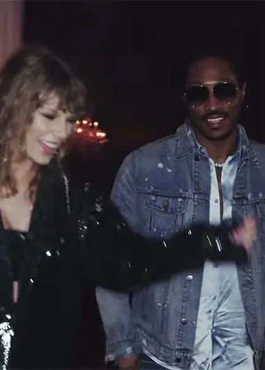Taylor Swift and Future in the End Game music video. Taylor is dancing and smiling while in a black outfit. Future is smiling in a denim jacket and sunglasses. 