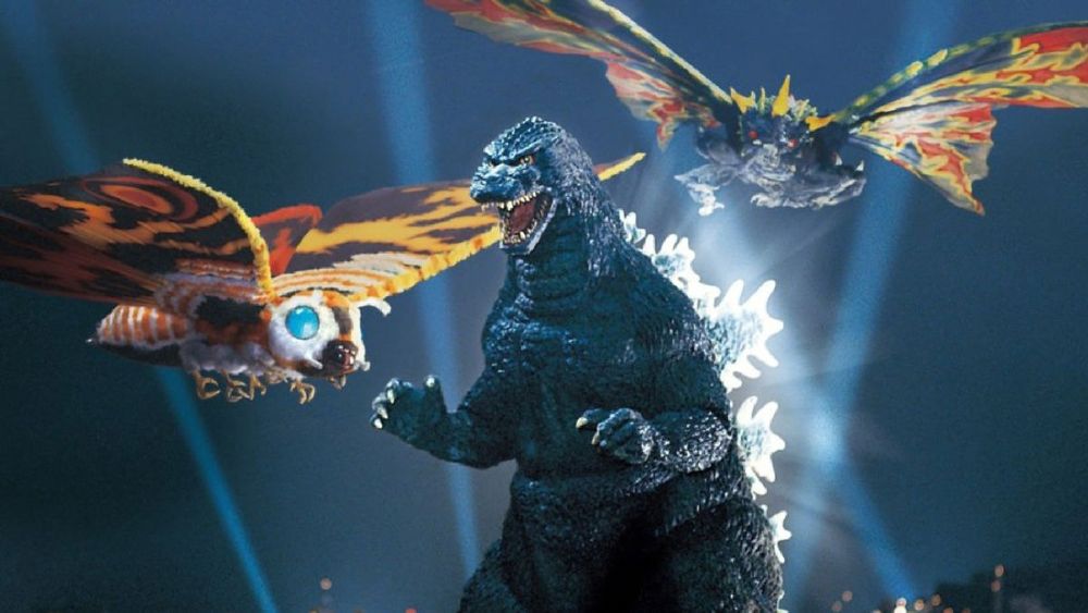Mothra and Battra circle Godzilla