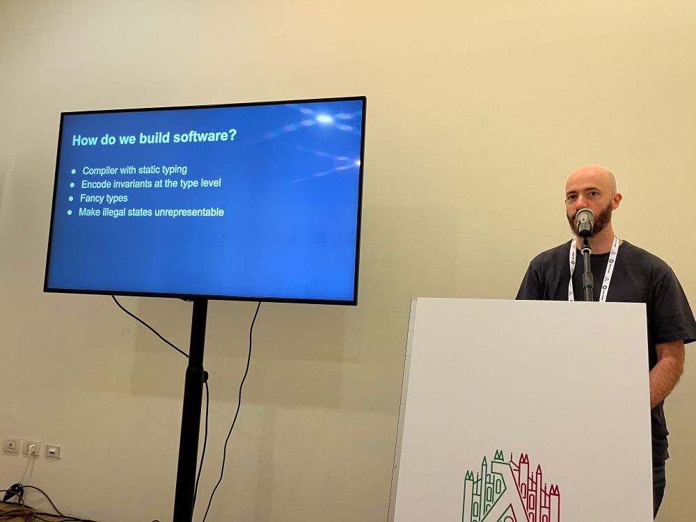 Photo of Marco Sampellegrini giving his keynote.