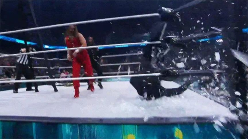 aew legend sting getting put through REAL GLASS at his final match at Revolution PPV