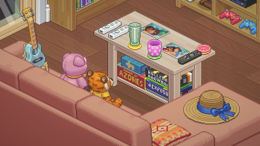 The living room from the final house in Unpacking. Piggy and the partner's tiger sit next to each other, and photos of the two women are on the table. 