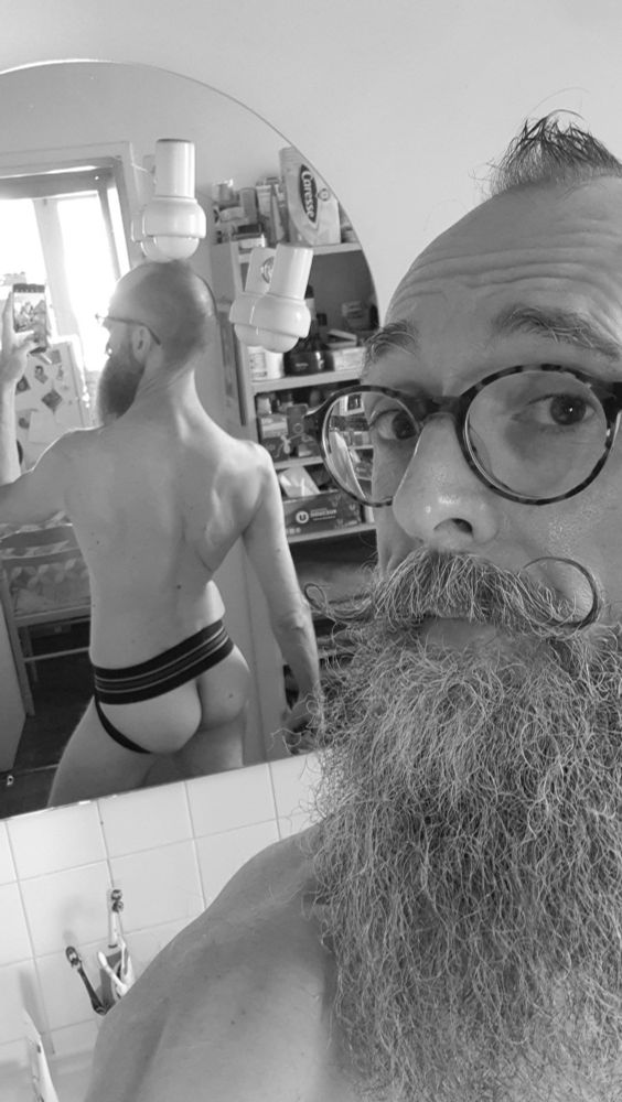 Shirtless Mirror selfie in black and white, in jockstrap this time. The rear view