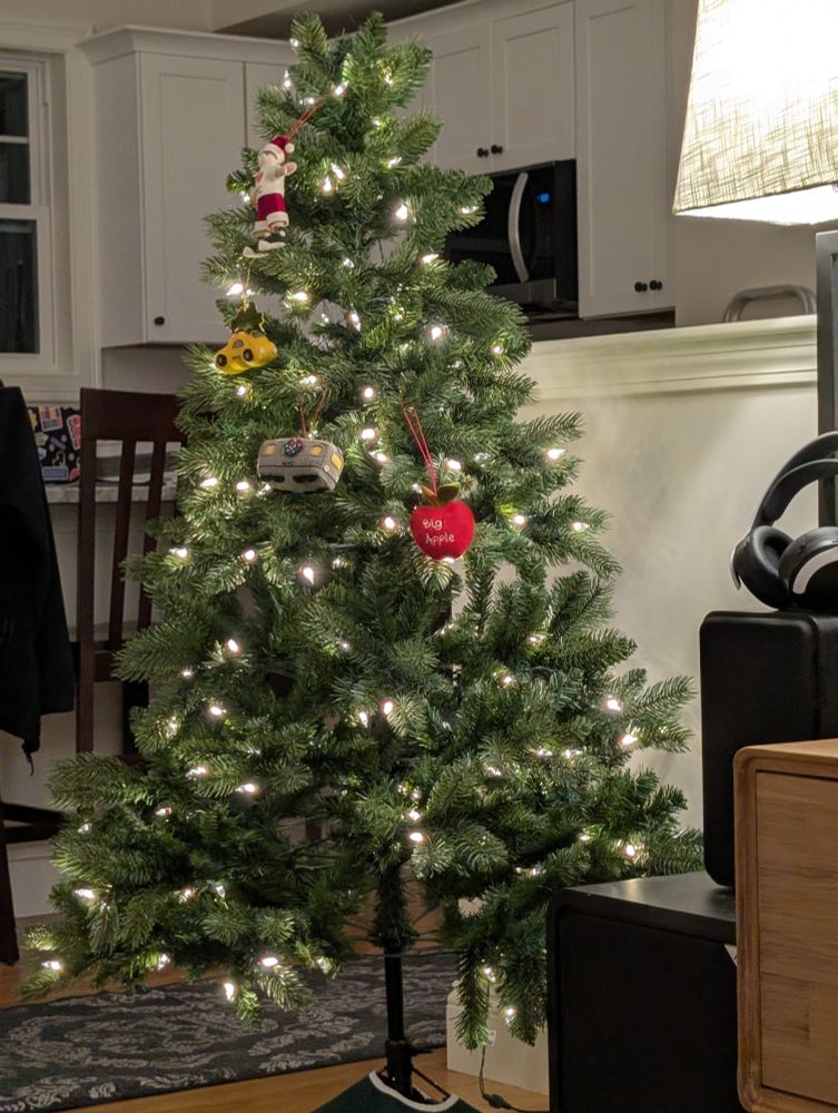 Christmas tree with a few New York themed ornaments 