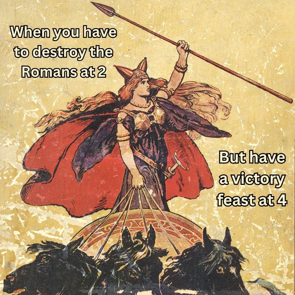 A stylised illustration of a fierce warrior woman with long, flowing hair and a horned helmet, standing in a chariot drawn by four black horses. She wears armour and a red cape, confidently holding a spear aloft. The background is textured in warm, earthy tones. The overlayed text reads: "When you have to destroy the Romans at 2 / But have a victory feast at 4."