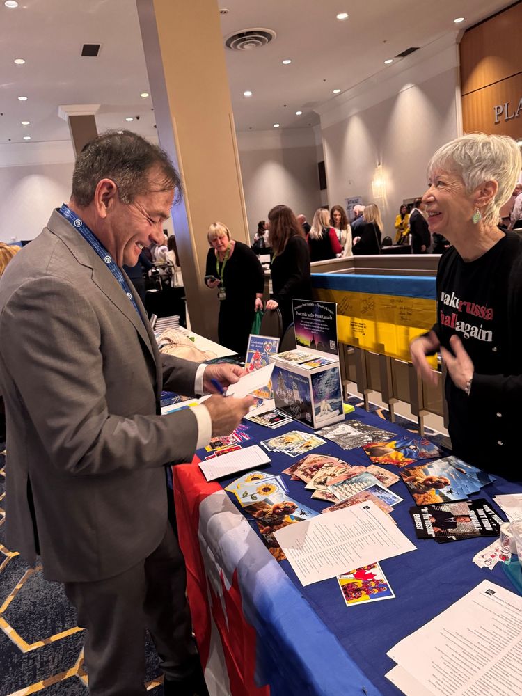 MP Anderson at the XXVIII Triennial Congress of Ukrainian Canadians, russian Embassy Protestors' table.