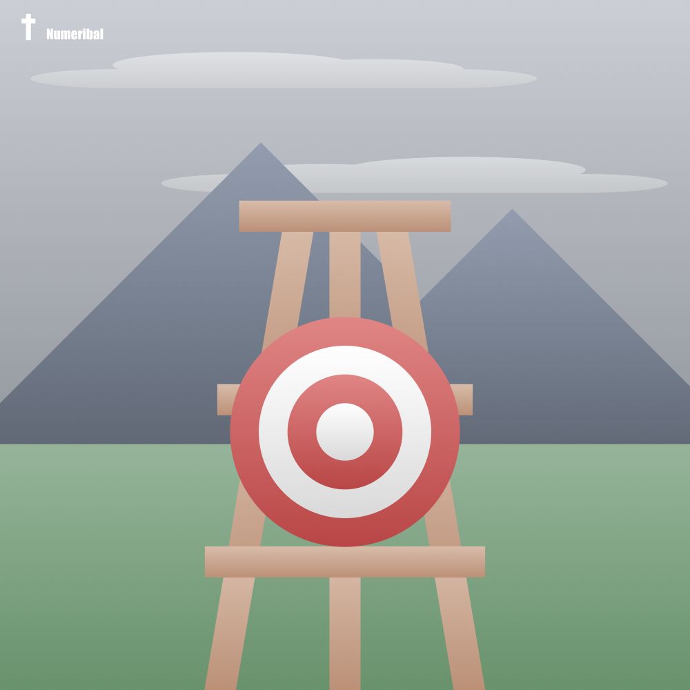 Lineless art of a target sitting on a wooden stand. Grass and mountains are behind it. The day is overcast.