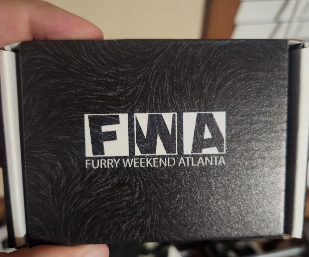 A black box with the words "FWA Furry Weekend Atlanta" in white text.