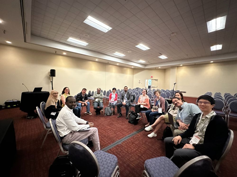 A group of researchers in a circle