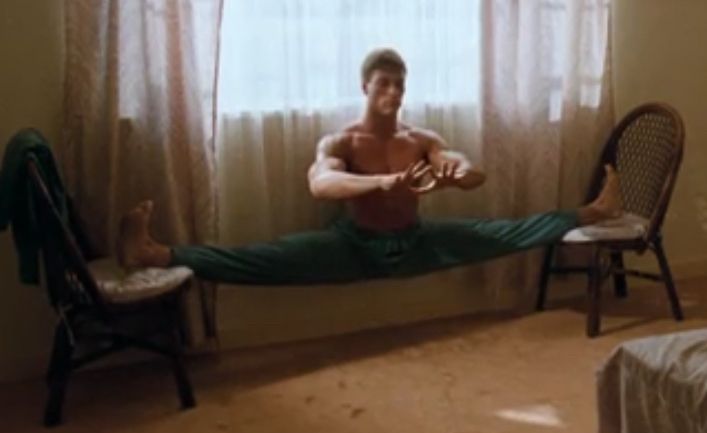 jean claude van damme meditating and doing the splits between two chairs in BLOODSPORT