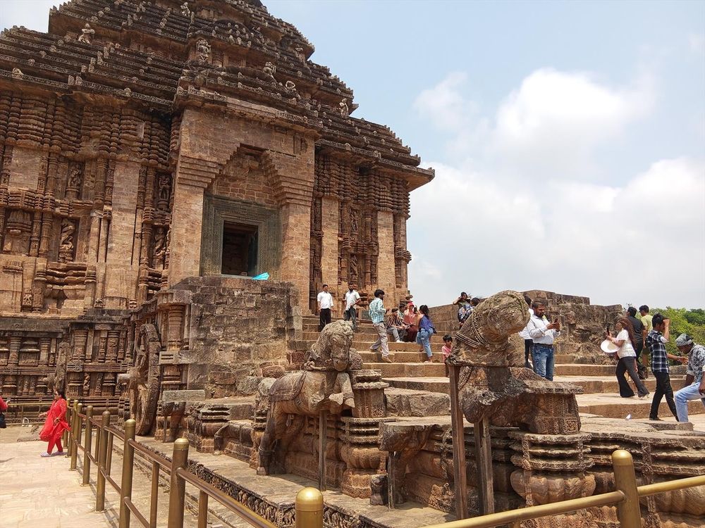 Konark sun temple in India, resembling the sun-chariot, with sun dials shaped as wheels, drawn by stone horses