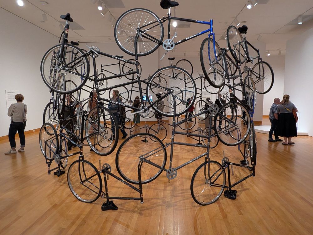 A popular brand of bikes welded together to create a circular wall of these seamless creations.