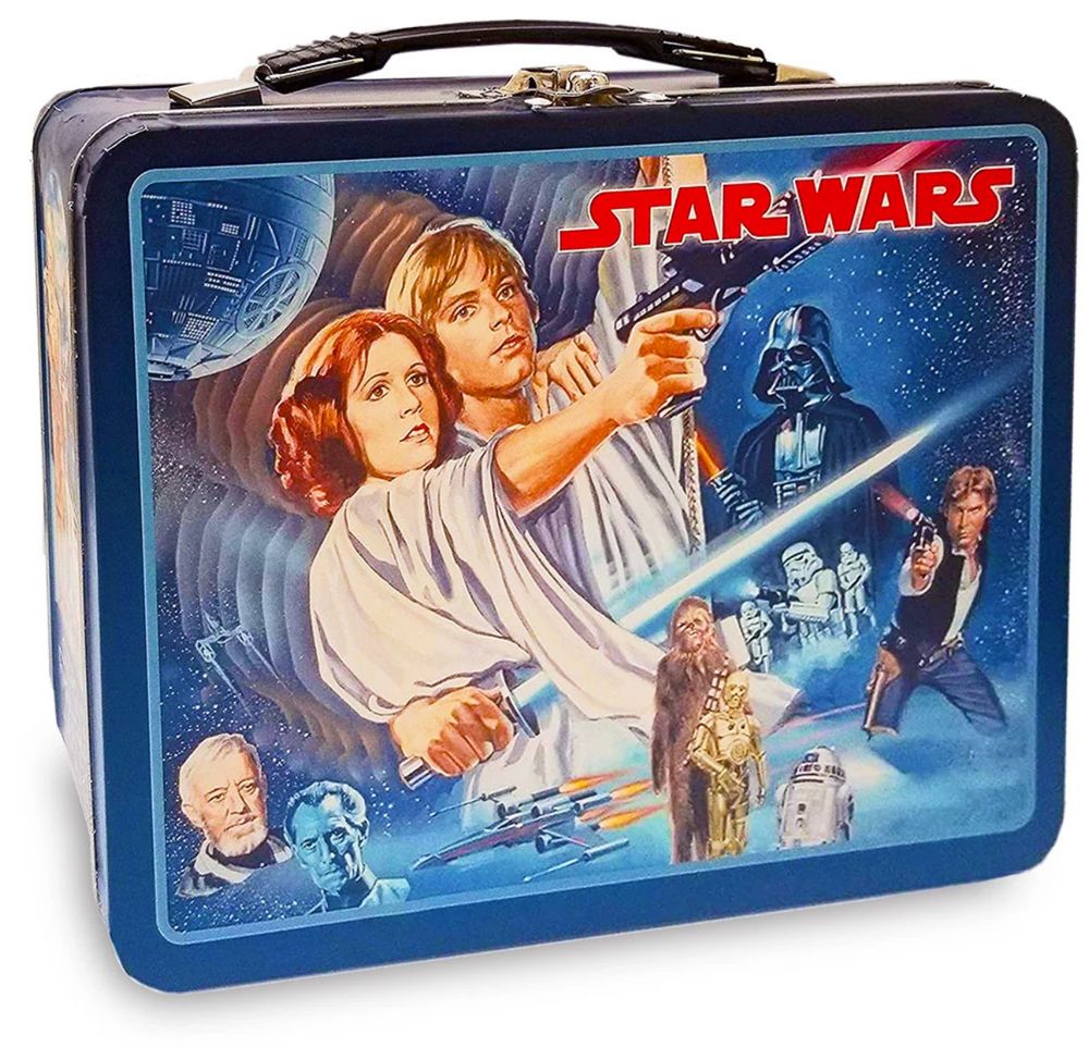 A Star Wars lunch box with illustrated scenes from the original movie on the front