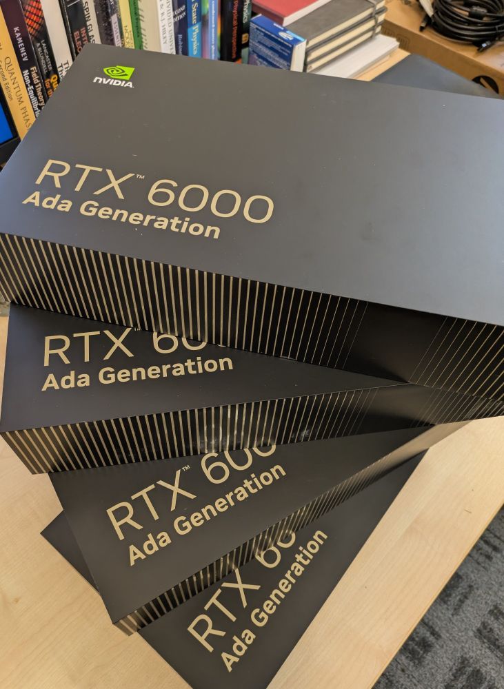 A stack of four NVIDIA GPUs to be used for my research work.