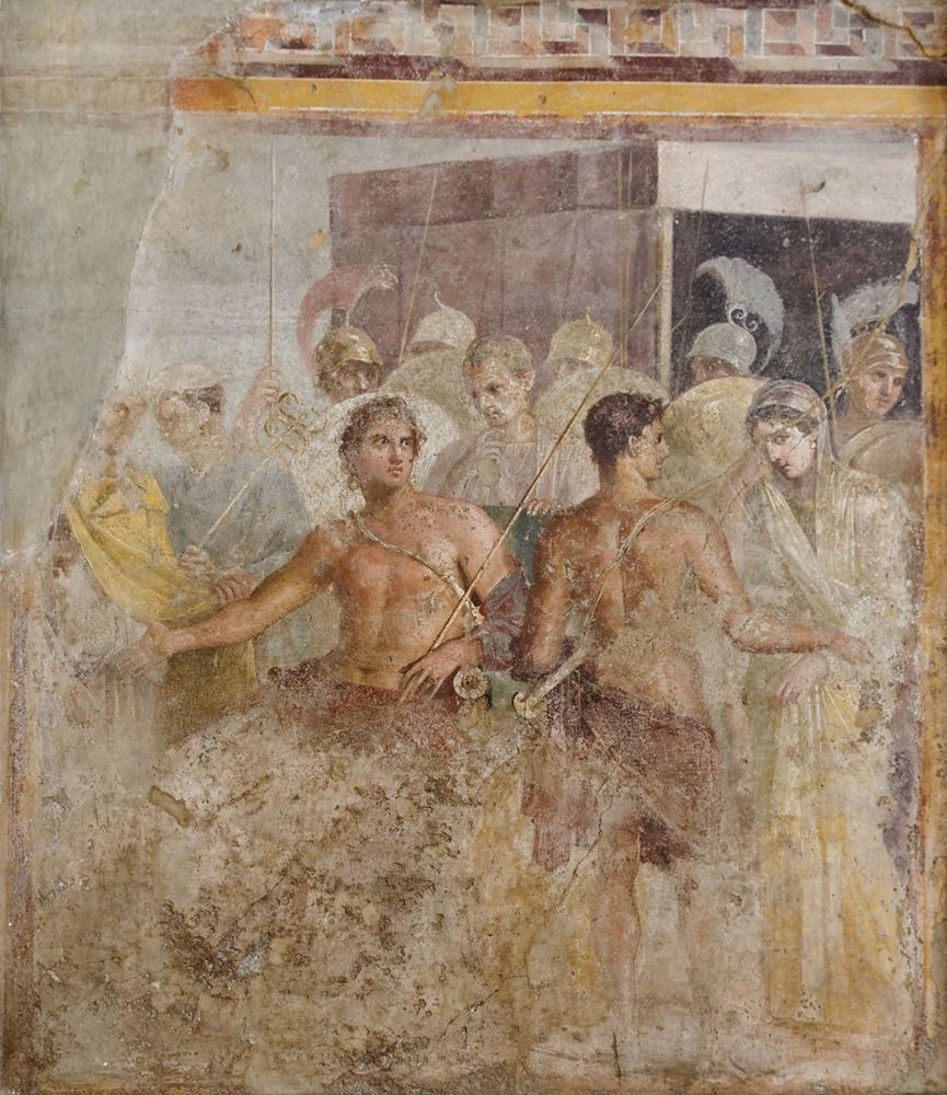 A crowded scene of figures, centred upon the figure of the seated Achilles. To the far right of the panel a draped female figure, Briseis, is ushered away by an escort of armed guards. She glances outward, seemingly fixing the viewer of the fresco with her left eye, as she wipes a tear from her right eye with the hem of her garment.