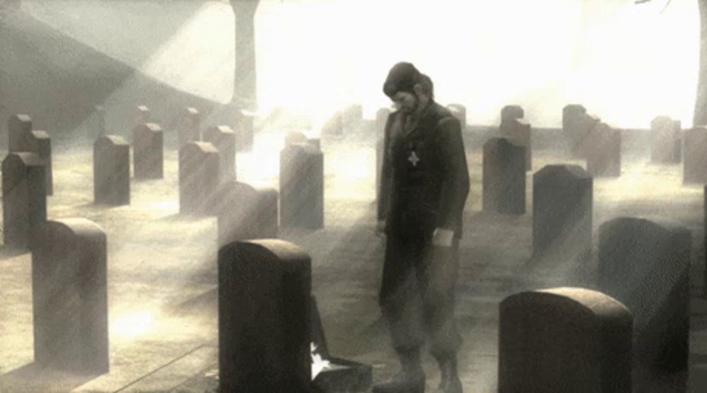 a man standing in a cemetery with a cross on his jacket