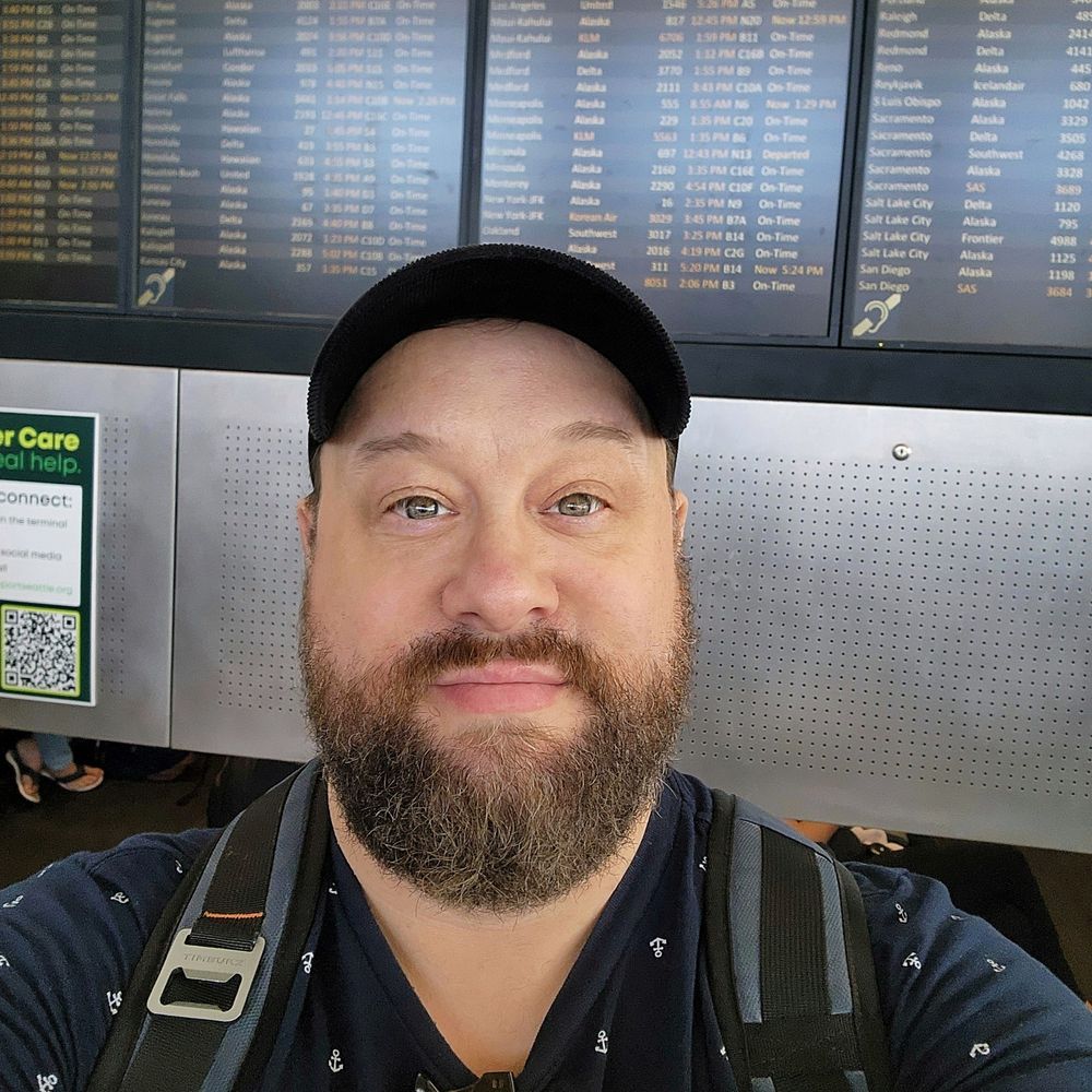 Bearded man selfie at the airport 