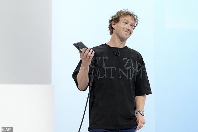 Mark Zuckerberg, Meta CEO, wearing a shirt that says aut zuck aut nihil.