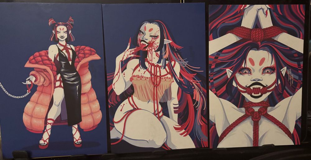 Three prints of female vampires in rope bondage. Art by Yoshi Yoshitani. The theme was “Shibari Vampires”.