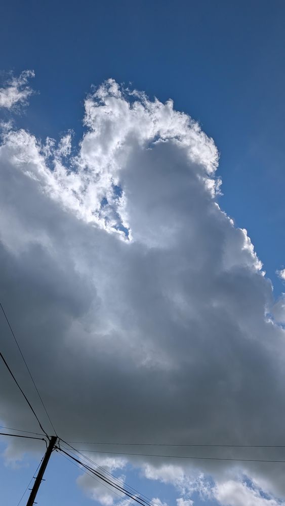 Sun hidden behind a small cloud. Not shown: wind.