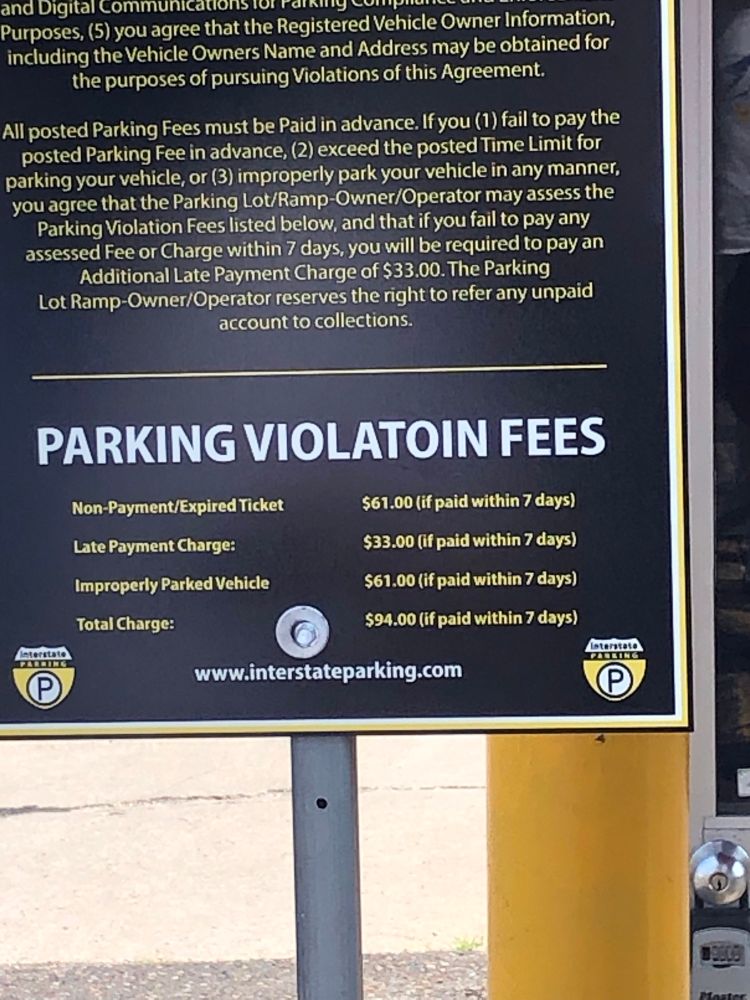 Sign that says “Parking Violatoin Frees”
