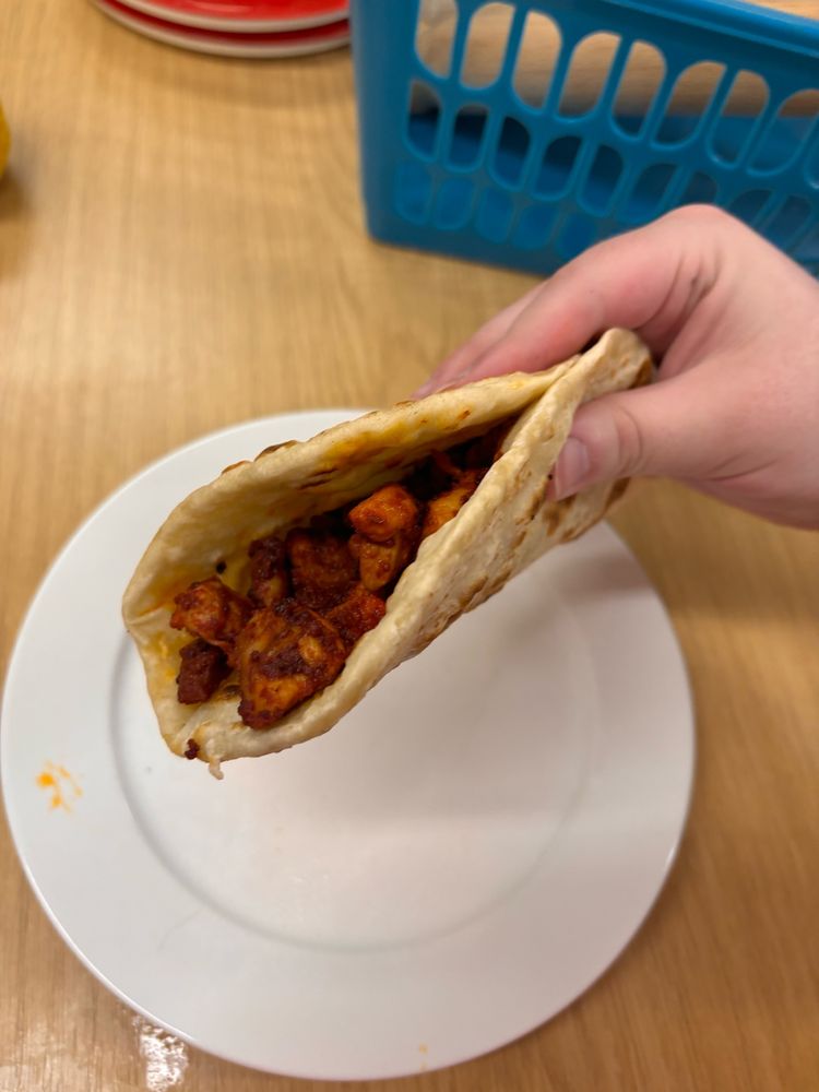 Homemade flatbread and spicy chicken