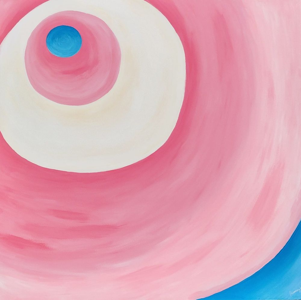 This is a large, abstract painting (100cm x 100cm) with a soft, flowing texture. The artwork consists of expanding rings of color, like ripples in water, using the pastel shades of the transgender flag: light blue, white, and soft pink.

At the very center is a small, circular patch of deep sky blue. Surrounding this is a ring of warm pink, blending outward into a creamy, off-white band. As the rings expand, the pink tones deepen and soften, creating a sense of movement, like waves gently spreading outward. The brushstrokes are smooth but varied, adding a tactile energy—some areas feel soft and airy, while others have more pronounced texture, as if the paint was swept across the canvas with emotion.

In the lower right corner, a curved section of bright blue interrupts the circular flow, creating a sense of contrast and grounding the composition. The overall effect is calming yet powerful, representing growth, transformation, and pride. The painting carries a sense of fluidity, much like the journey of self-discovery, making it a strong statement of transgender identity and resilience.