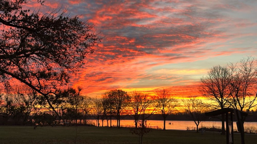 Sunrise - pink, red, yellow orange sky.